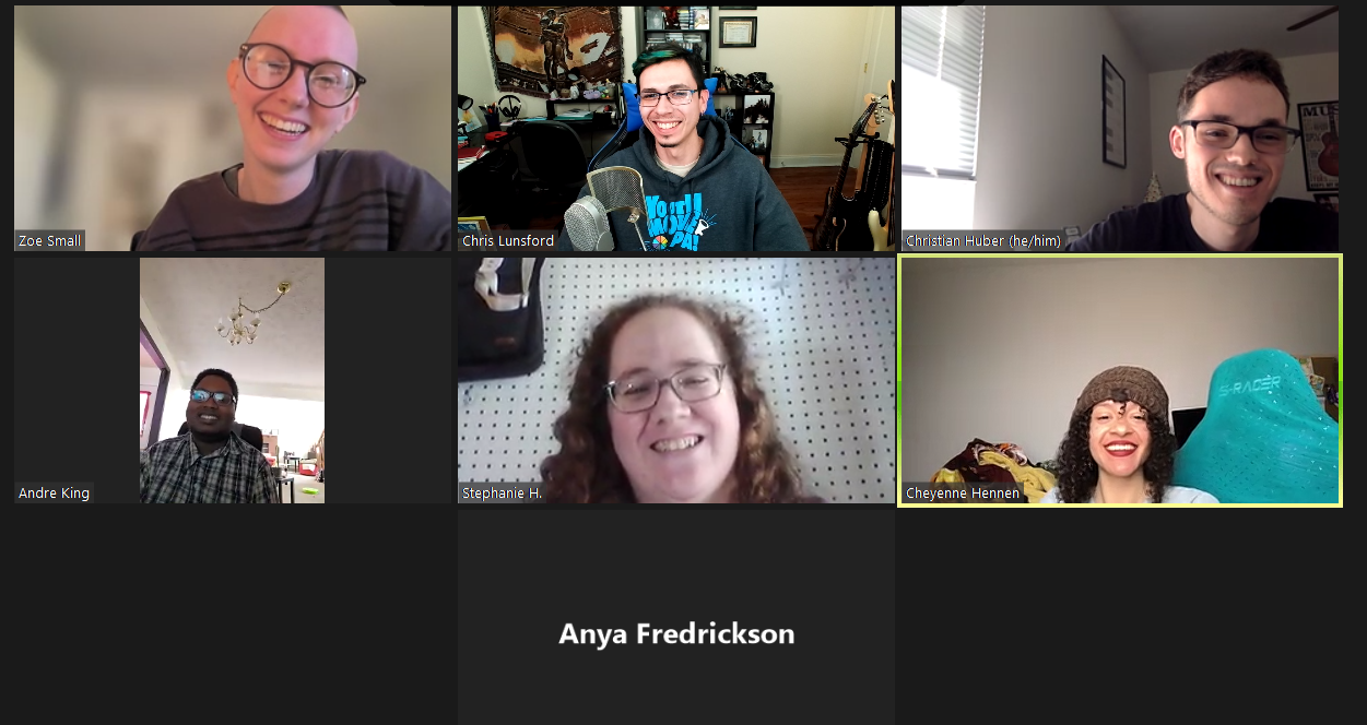 A screenshot of a Zoom meeting with several people smiling